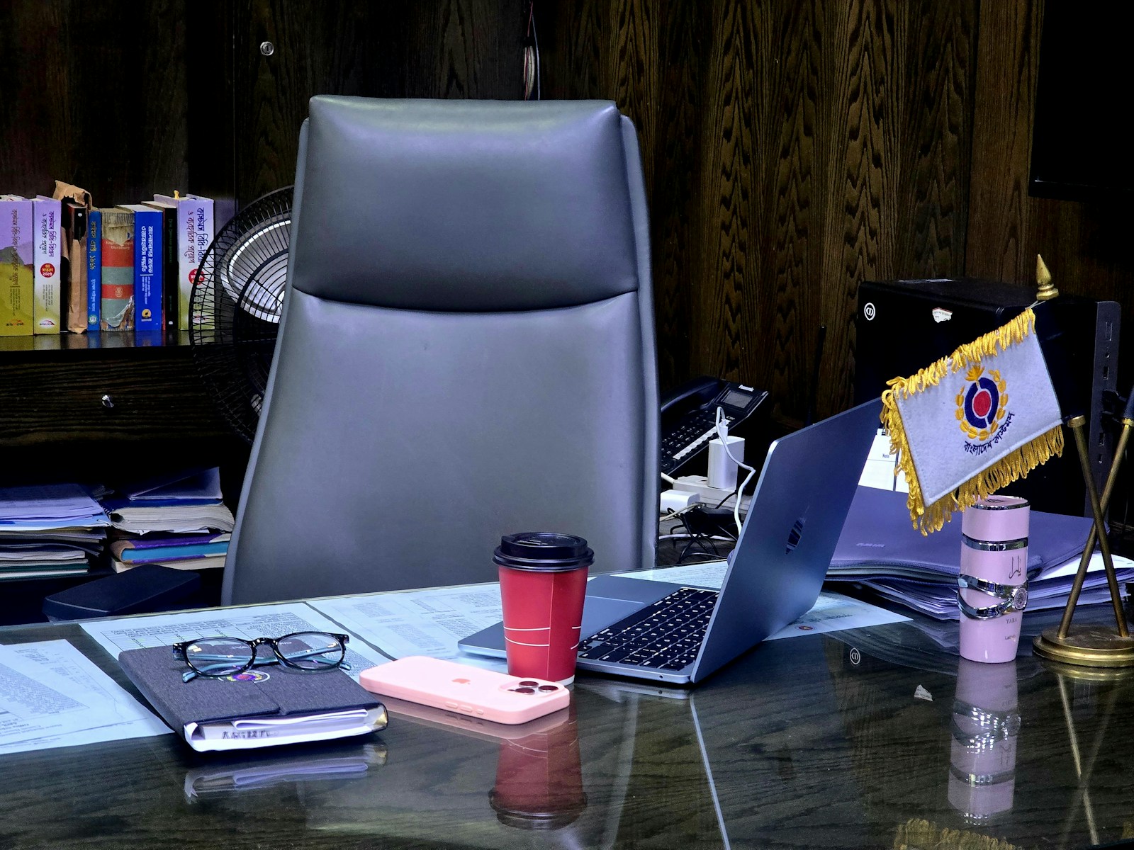 Organized design workspace with laptop and office supplies for marketing content planning