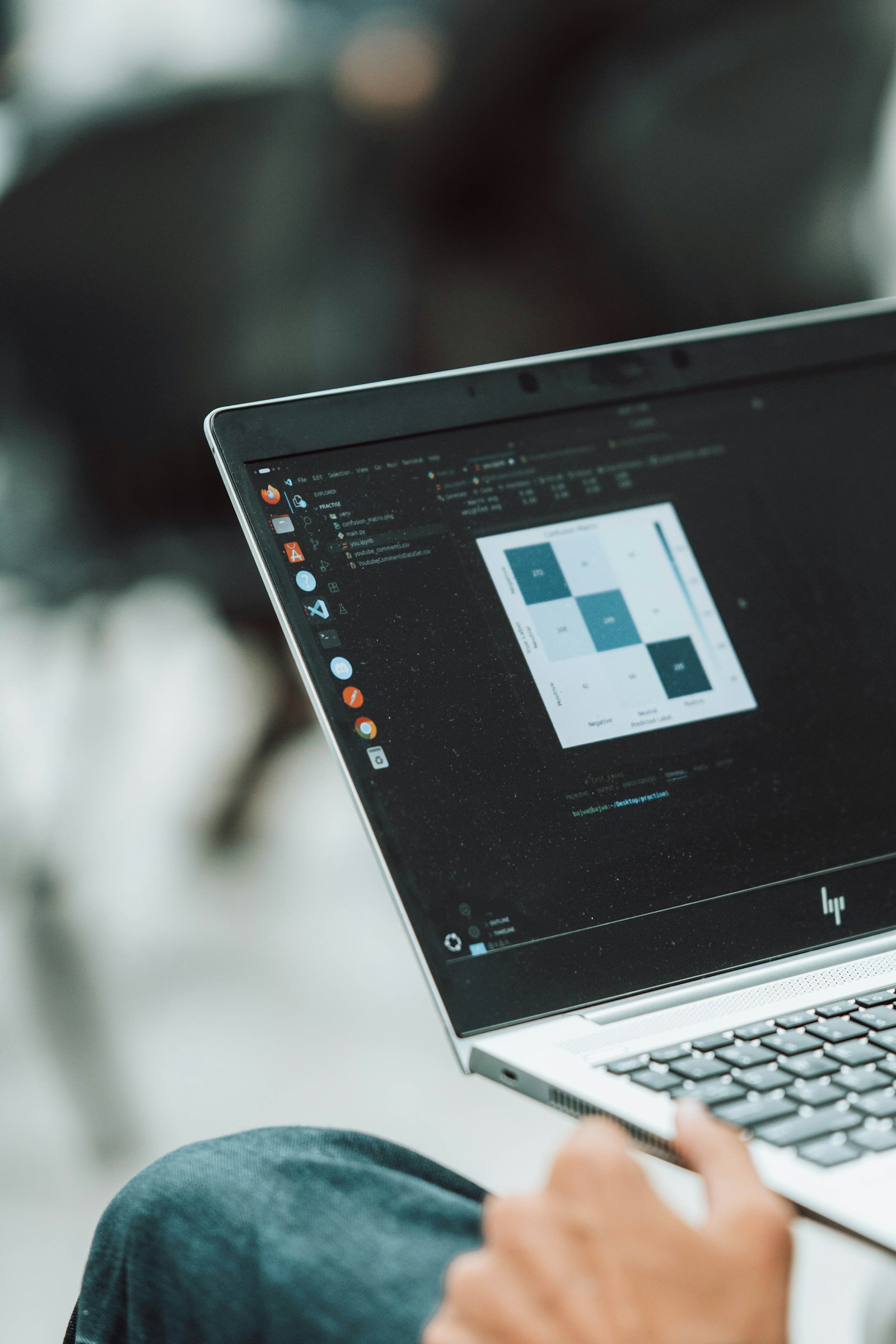 Laptop displaying data analysis for marketing campaign reporting
