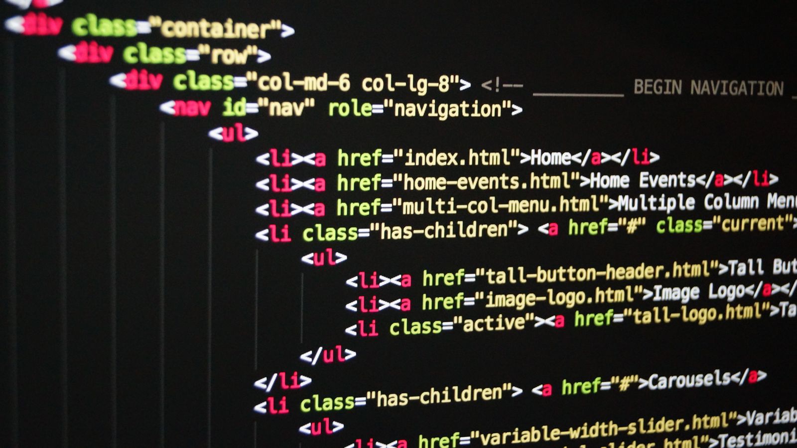 Close-up of website code on a screen for website development and technical performance work.