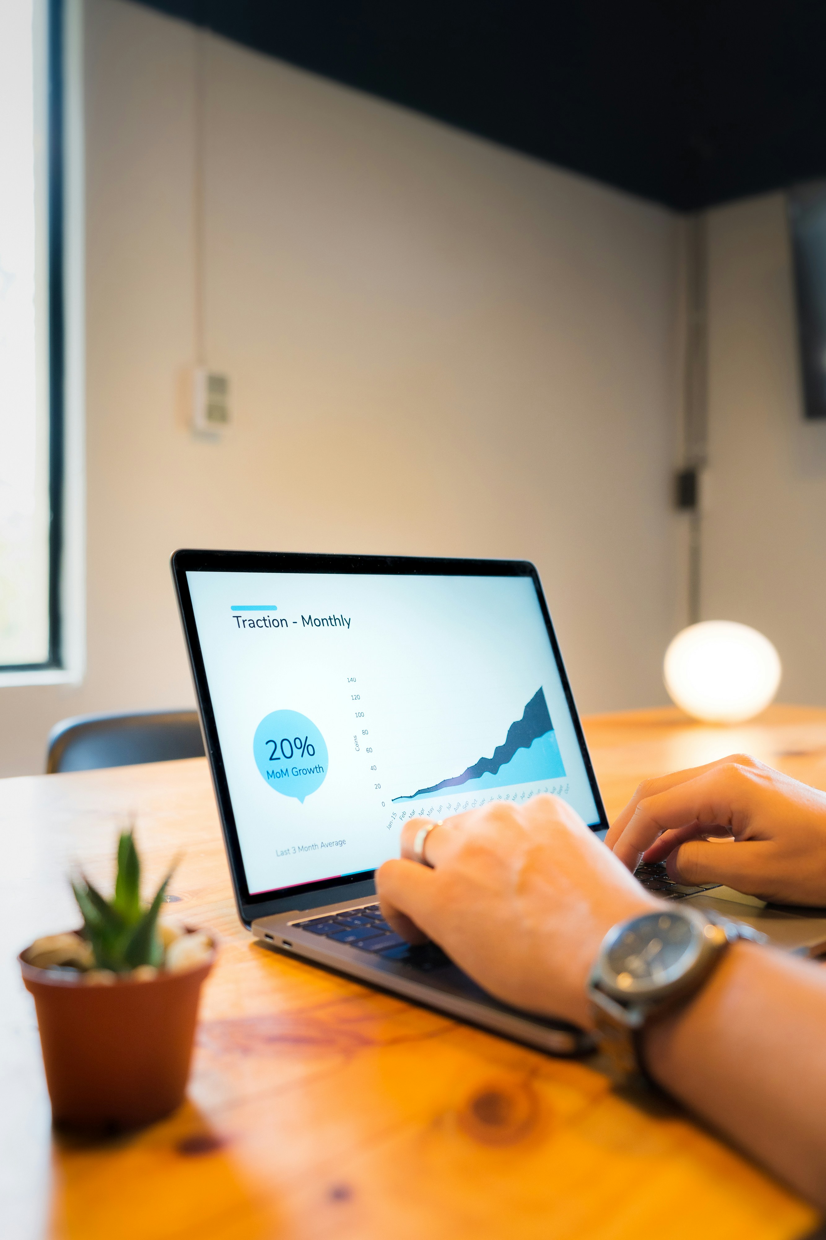 Person reviewing marketing analytics on a laptop